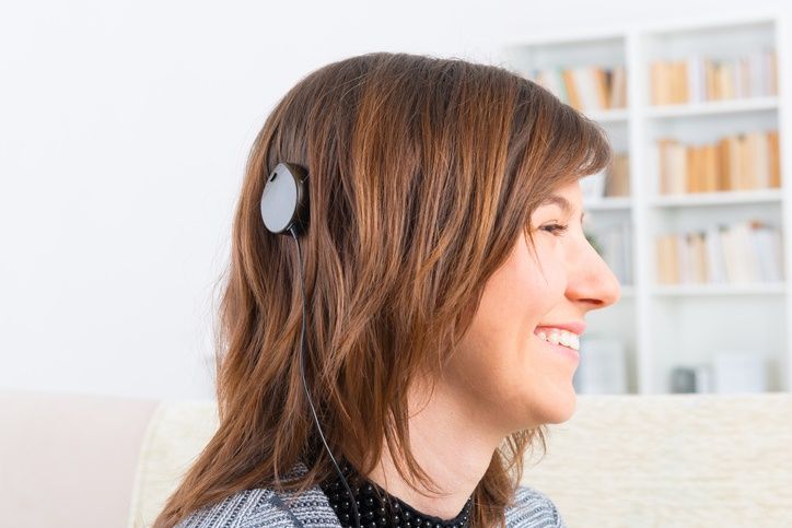 Woman with a Cochlear Implant